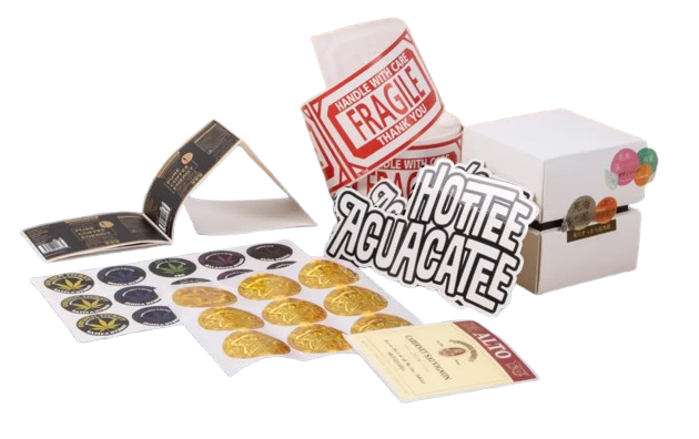 Custom printed labels and stickers: gold foil seals, round labels, a roll of fragile labels and die-cut vinyl lettering