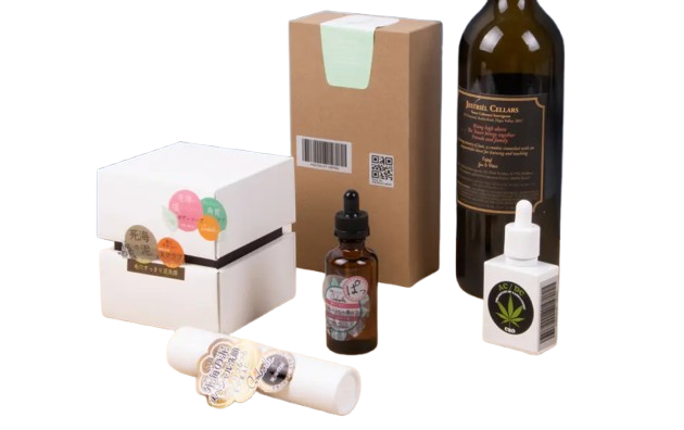 Printed labels applied to a wine bottle, dropper bottles, a kraft box and a cosmetics tube